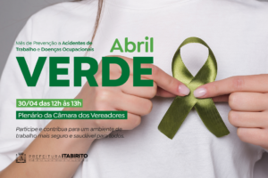 Pessoa segurando laço verde em alusão à campanha Abril Verde